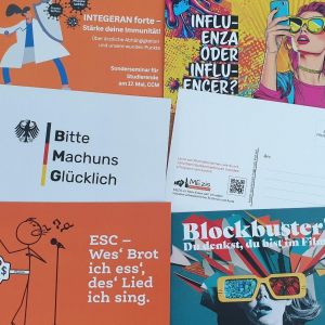Foto von verschiedenen MEZIS-Werbekarten