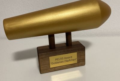 Foto des Preises in Form eines goldenen Zäpfchens